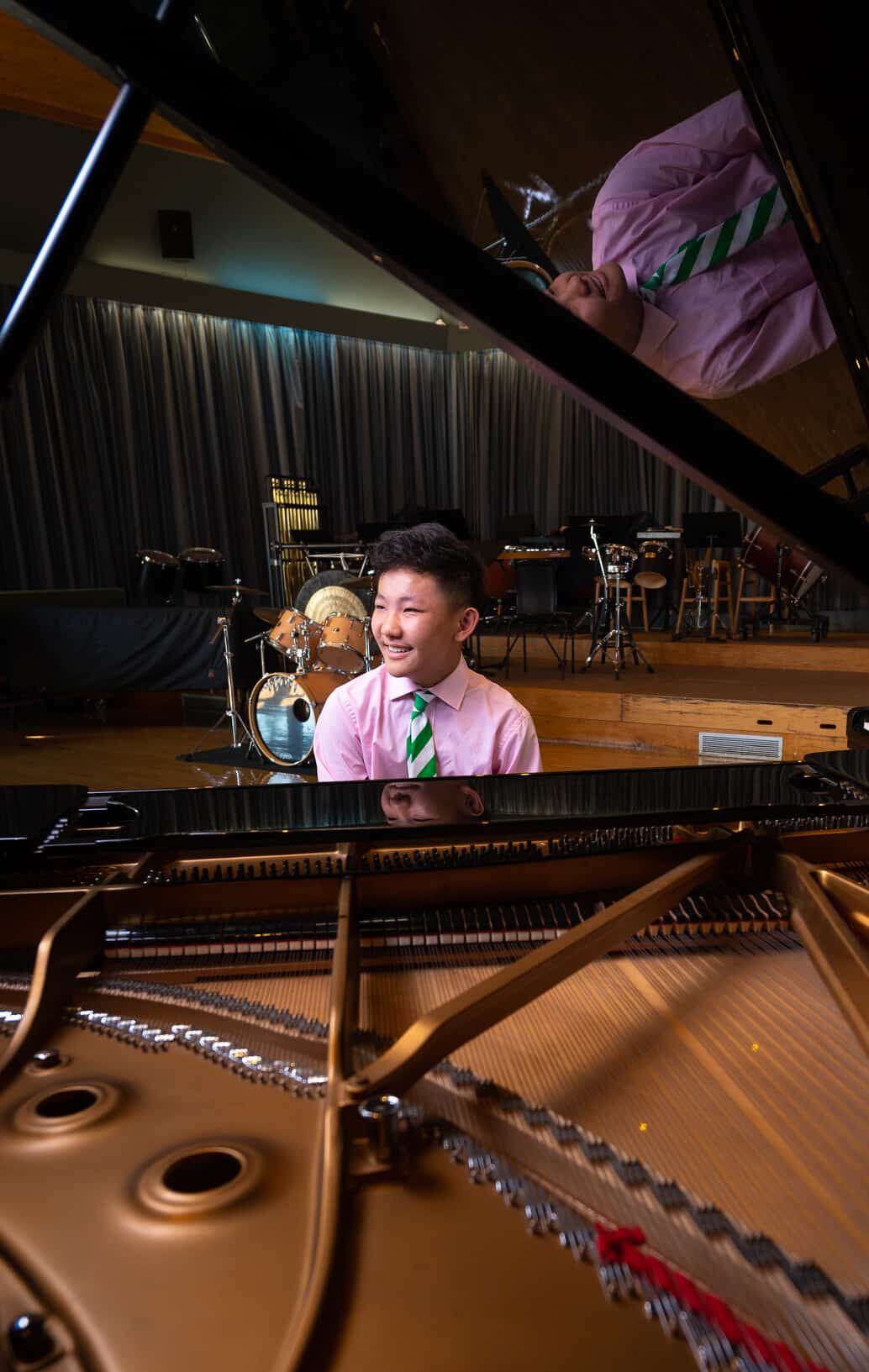 Boy playing the piano