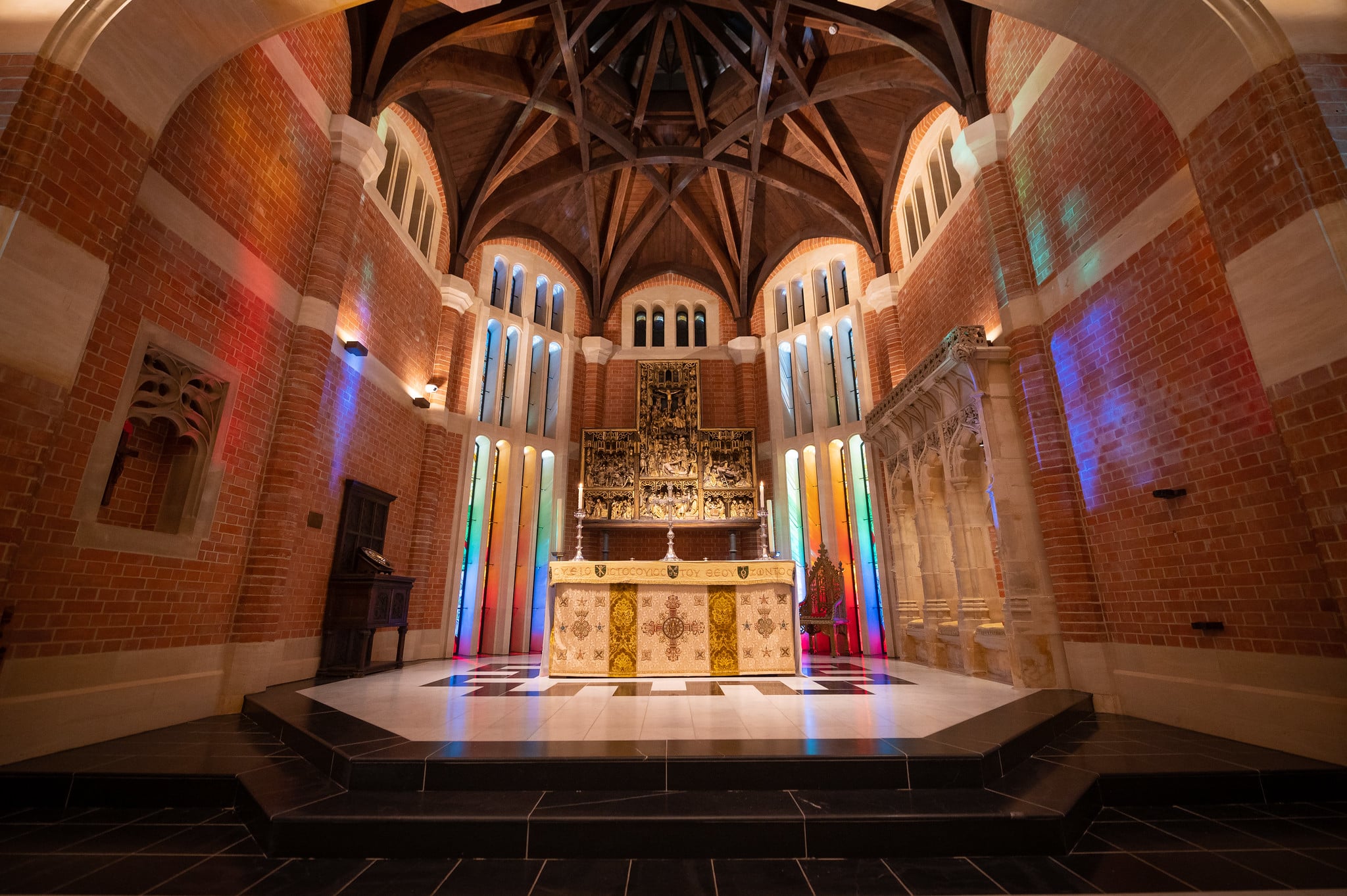 Radley College Chapel with beautiful stained glass windows and altar