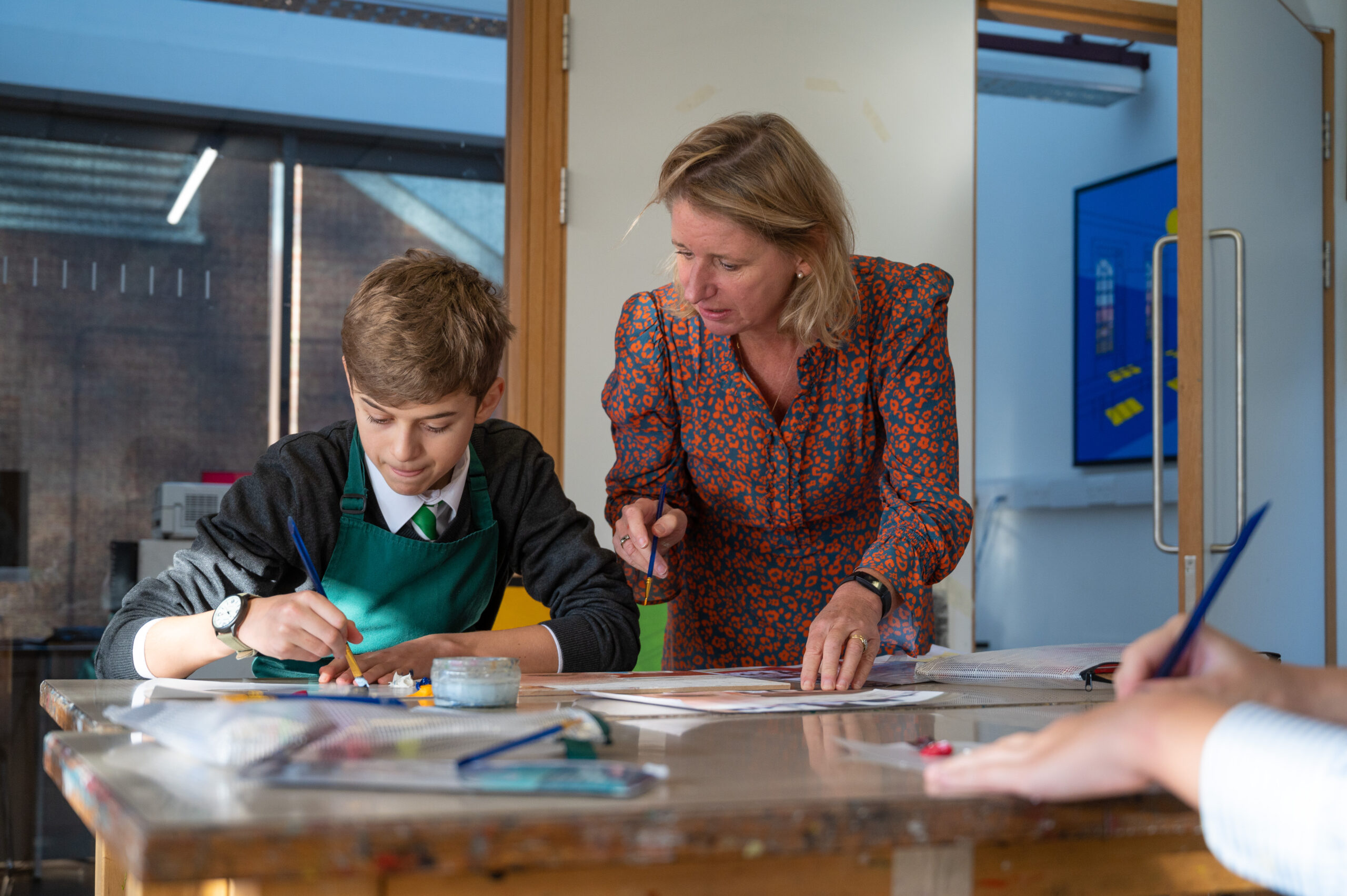 Teacher in art classroom at Radley College