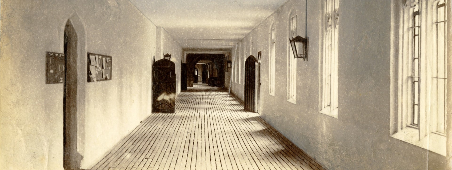Historic photo of covered passage with flooboards.